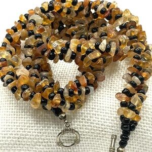 Chunky Necklace Triple Strands of Beads. Assorted brown tones